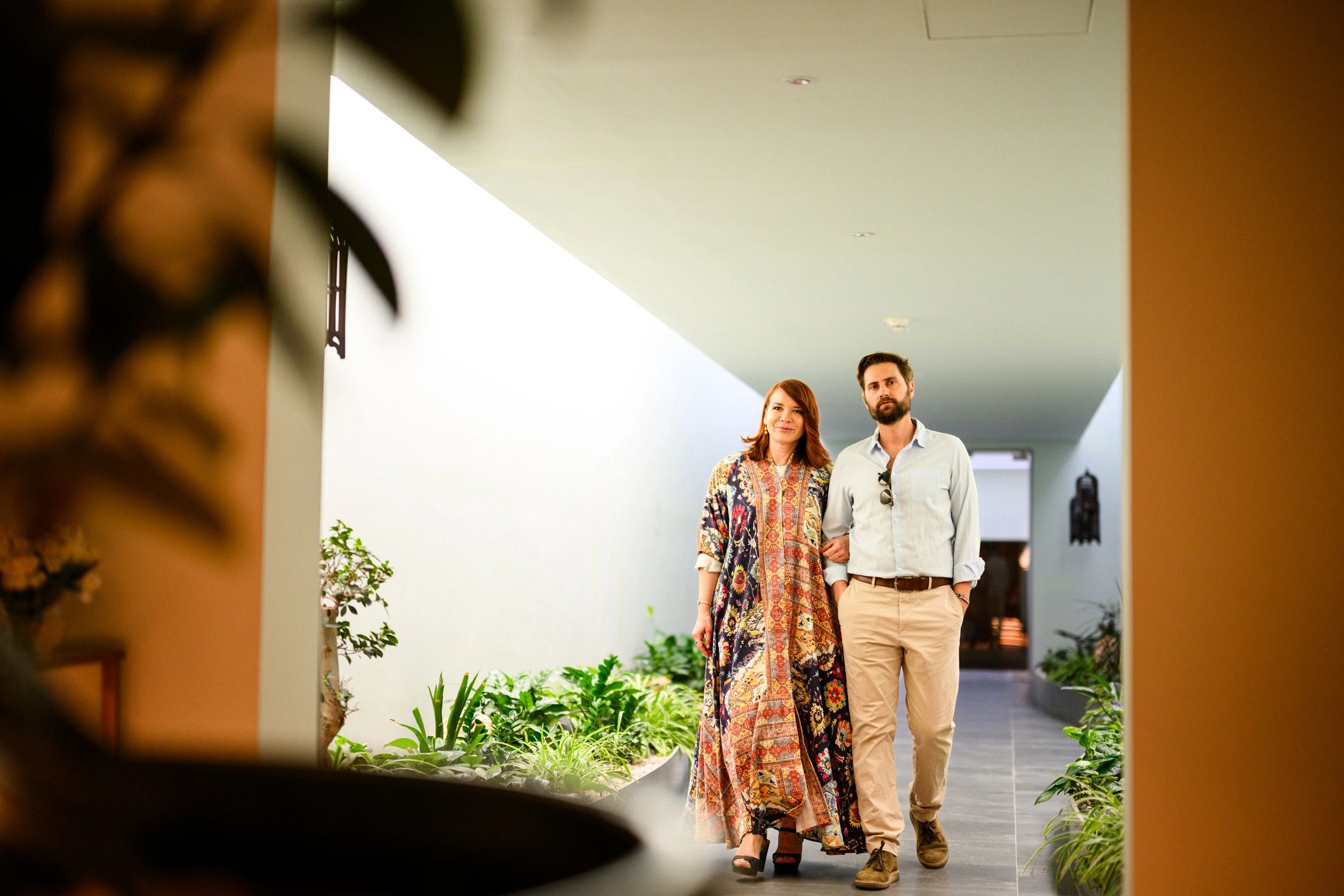 Couple arriving at a stylish resort for a romantic multi-centre trip
